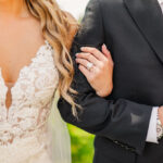 bride and groom arm in arm